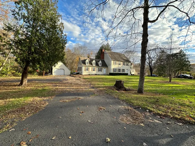 a view of a house with a big yard