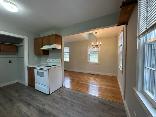 a kitchen with stainless steel appliances a stove and a refrigerator