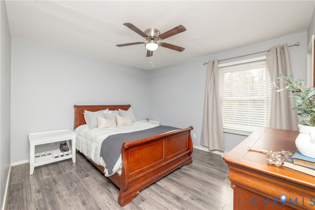 16104 Sandwave Road Chester, VA 23831 - Photo 18 of 24 a bedroom with a bed and window
