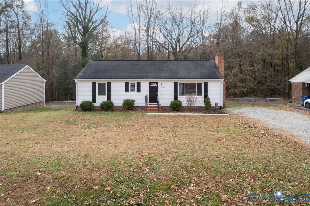 16104 Sandwave Road Chester, VA 23831 - Photo 2 of 24 front view of a house with a yard