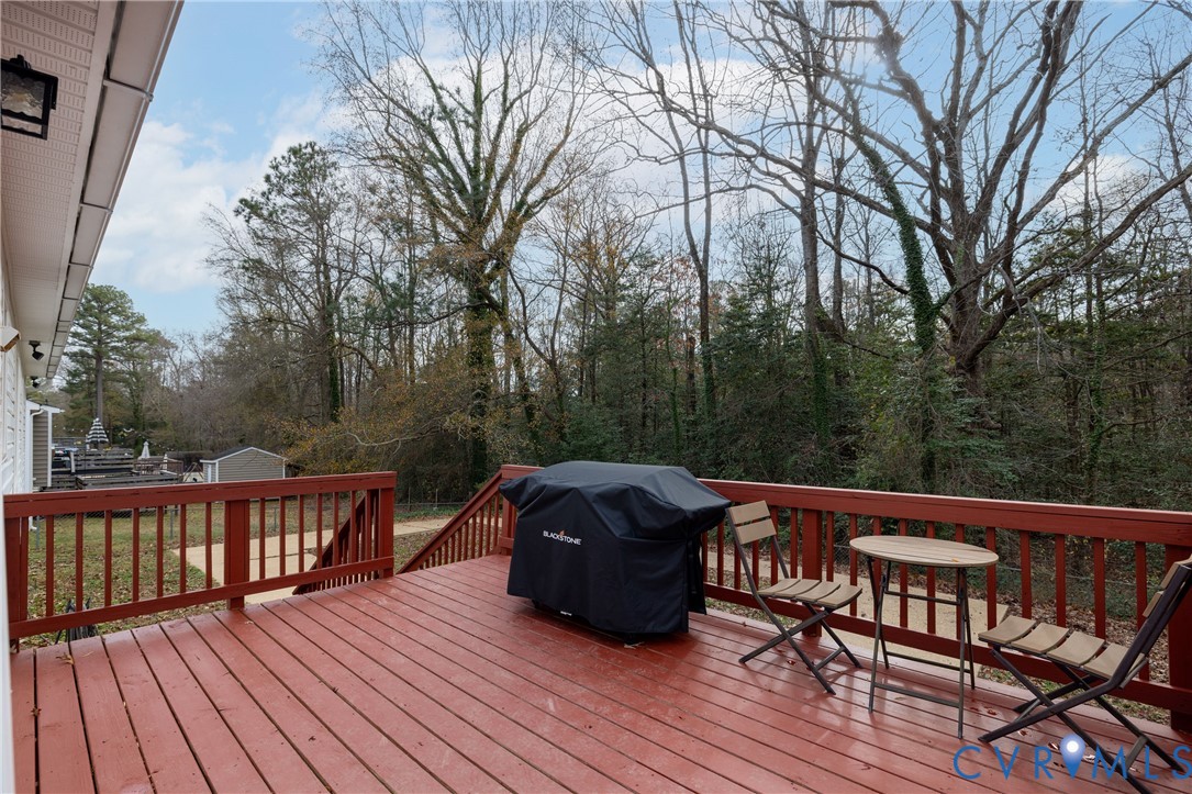 16104 Sandwave Road Chester, VA 23831 - Photo 21 of 24 a view of balcony with wooden floor and outdoor space