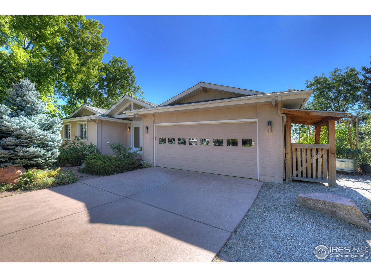 656 Furman Way Boulder, CO 80305 - Photo 3 of 6 a view of a house with a yard