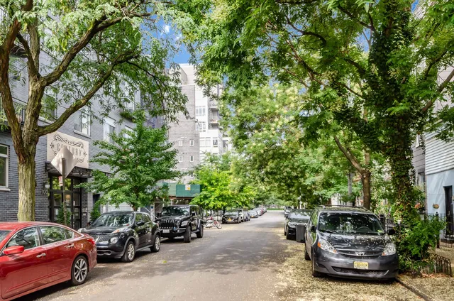 a front view of a building with street view