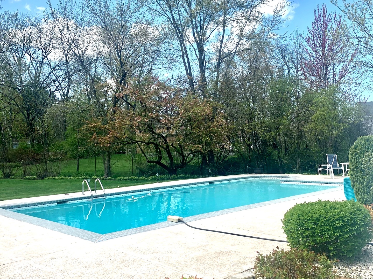 1780 Sunset Ridge Road Northbrook, IL 60062 - Photo 3 of 11 a view of a swimming pool with a yard