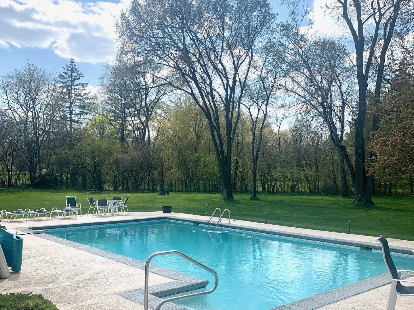 1780 Sunset Ridge Road Northbrook, IL 60062 - Photo 4 of 11 a view of a swimming pool and a yard