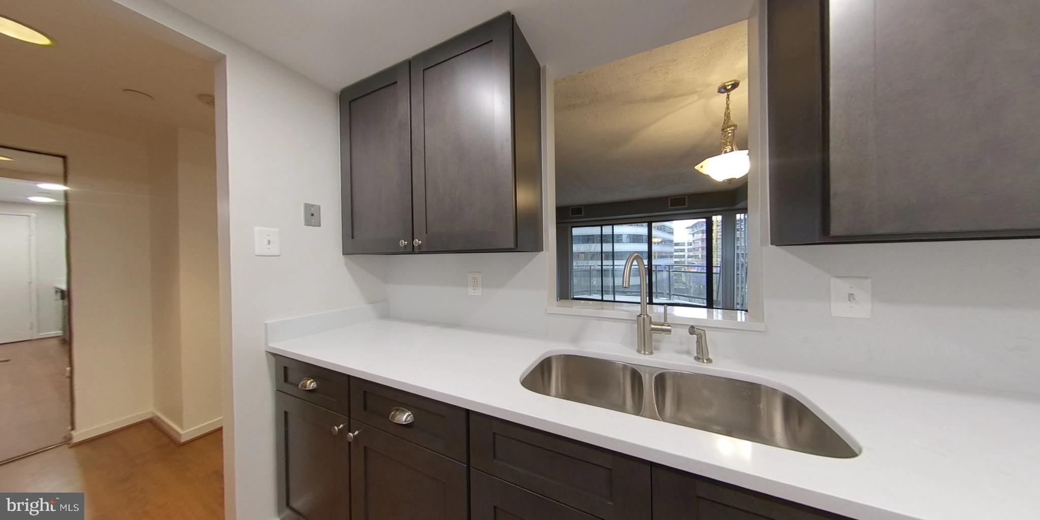 1530 Key Boulevard, Unit 623 Arlington, VA 22209 - Photo 12 of 35 Pass through to the dining room for more light