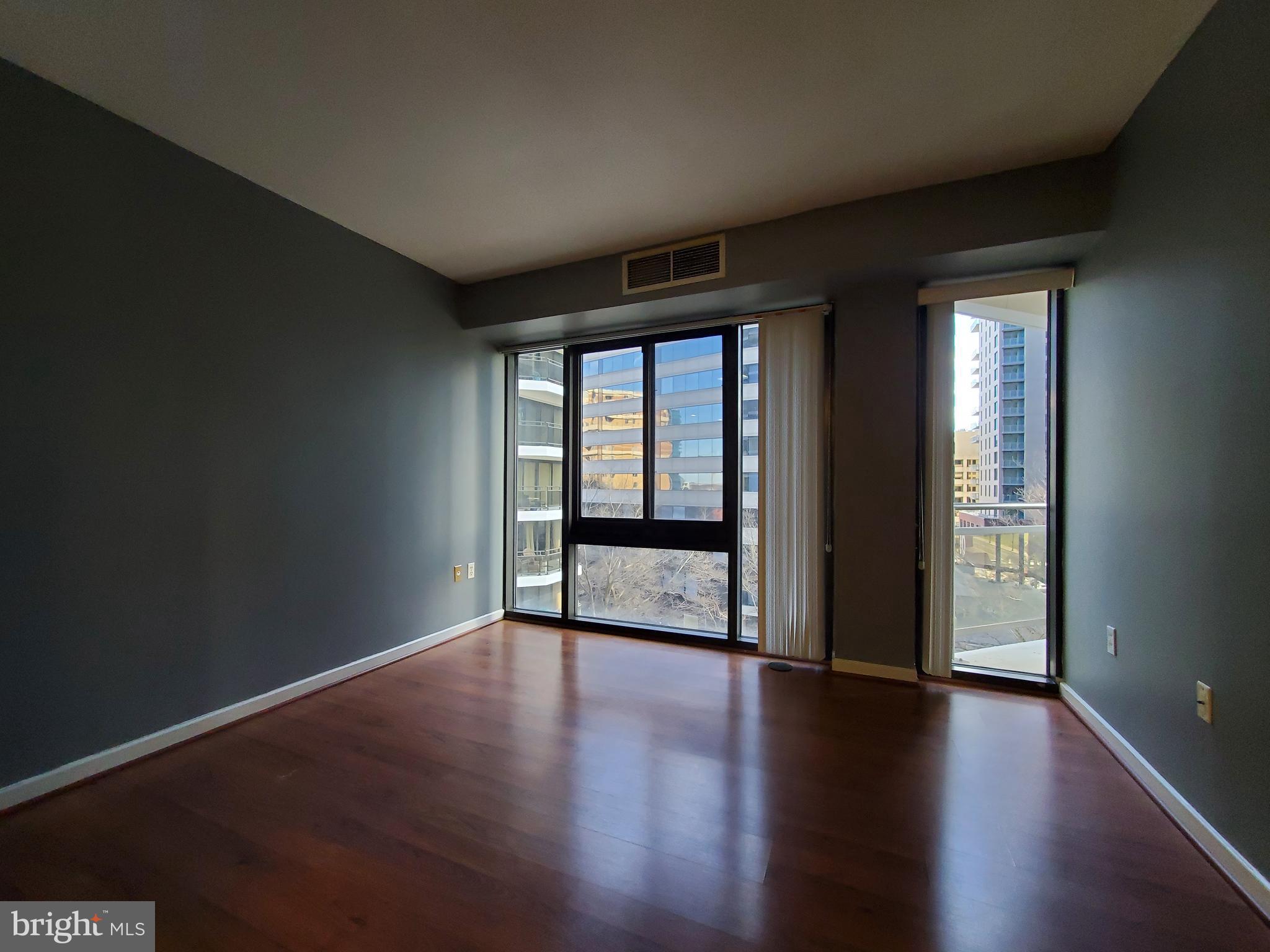 1530 Key Boulevard, Unit 623 Arlington, VA 22209 - Photo 13 of 35 Bedroom with vertical blinds for privacy