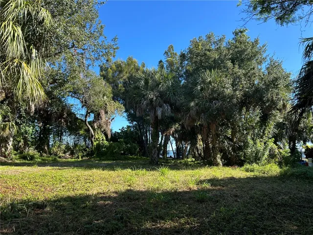 a view of swimming pool of an outdoor space and seating area