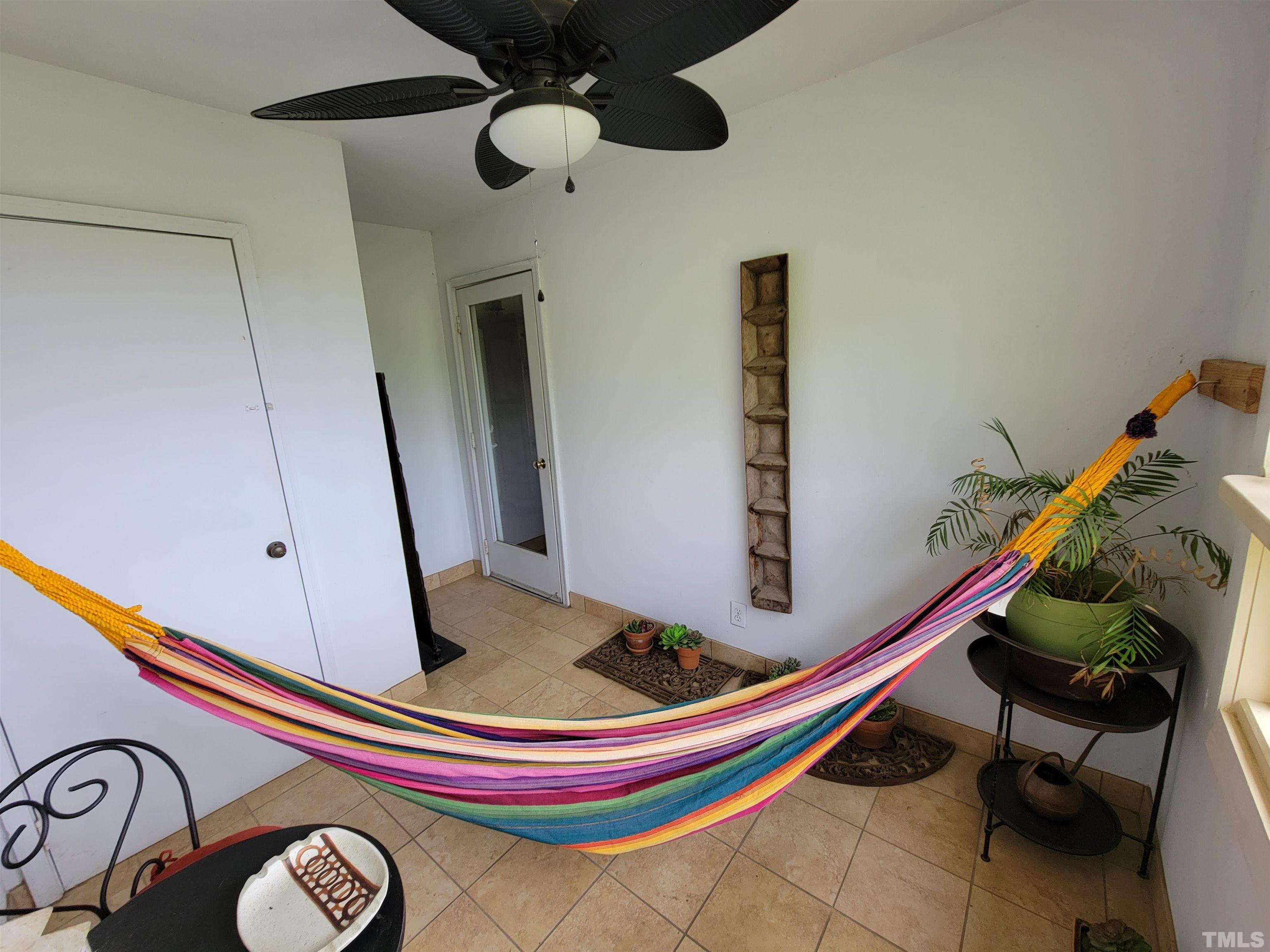 3601 Helix Court, Unit 302 Raleigh, NC 27606 - Photo 19 of 21 a room with musical instruments and stairs