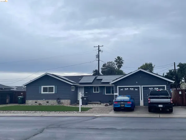 a car parked in front of a house