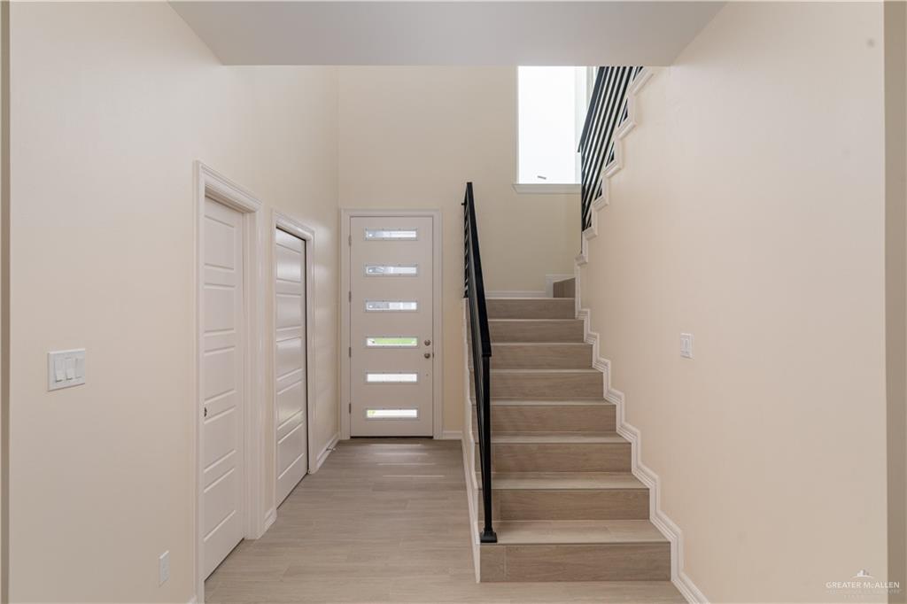 5406 North Crown Point Pharr, TX 78577 - Photo 12 of 15 a view of entryway and hall with wooden floor