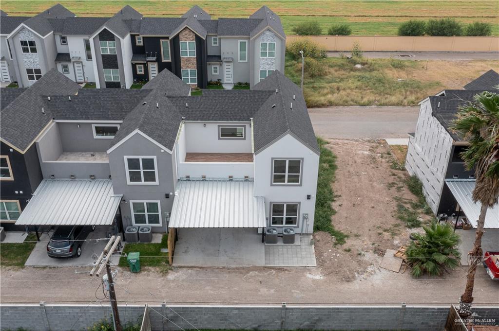 5406 North Crown Point Pharr, TX 78577 - Photo 3 of 15 a front view of a house with garden