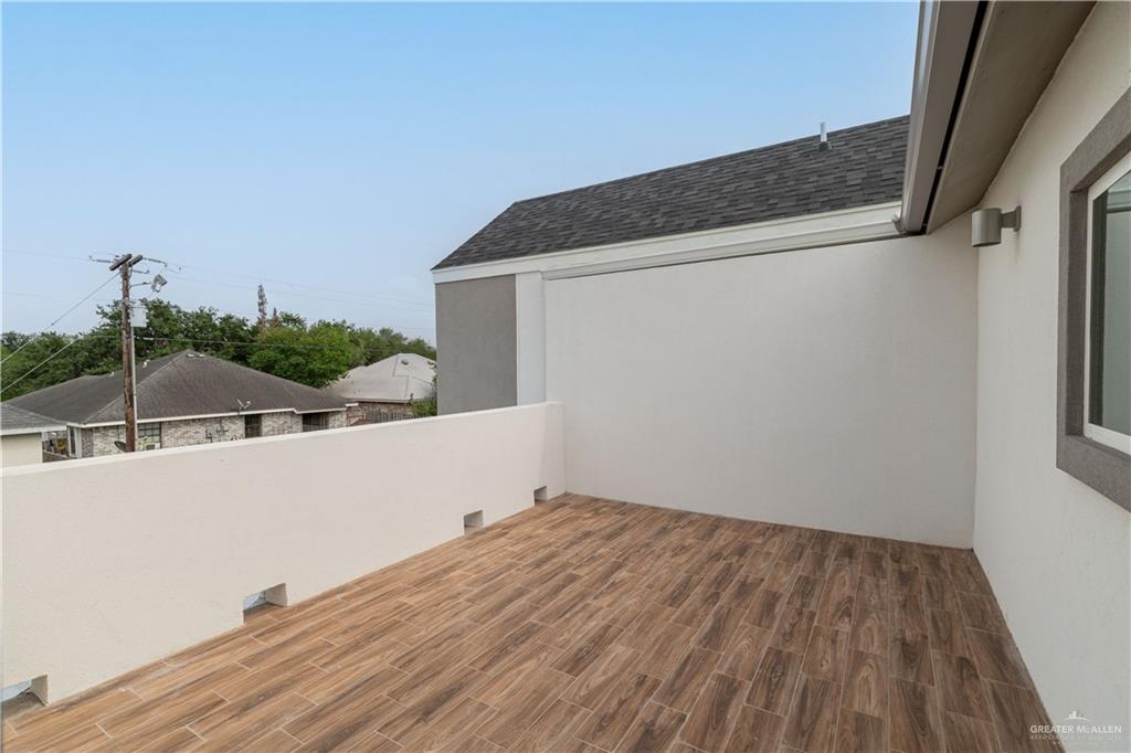 5406 North Crown Point Pharr, TX 78577 - Photo 4 of 15 a view of balcony with wooden floor