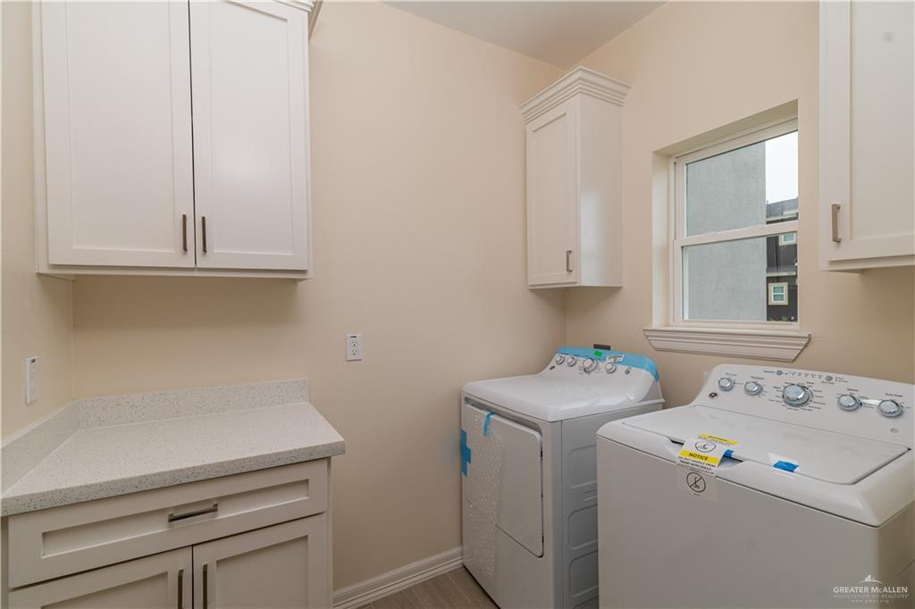 5406 North Crown Point Pharr, TX 78577 - Photo 9 of 15 a utility room with dryer and washer