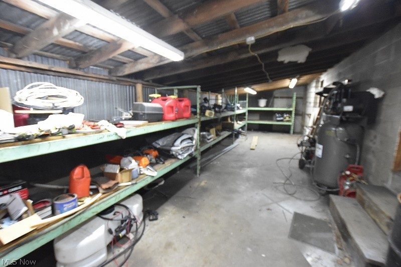 5007 Raven Road Southeast Carrollton, OH 44615 - Photo 36 of 50 This is a large storage room located on the back side of the 5 bay garage.