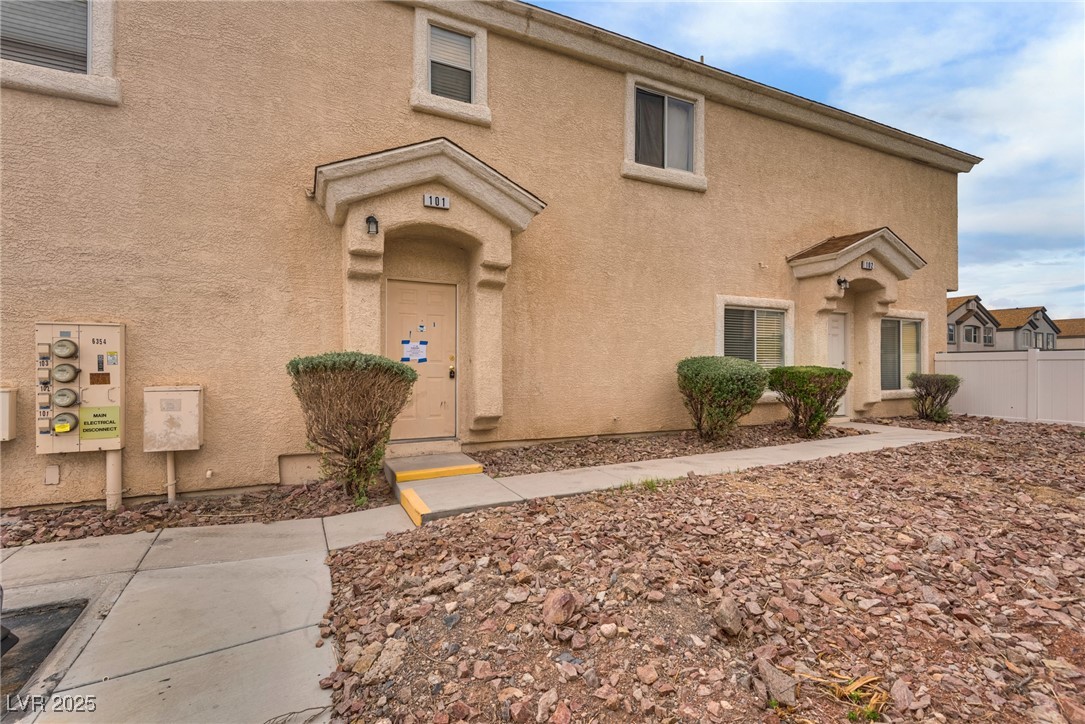 View of front of house featuring stucco siding