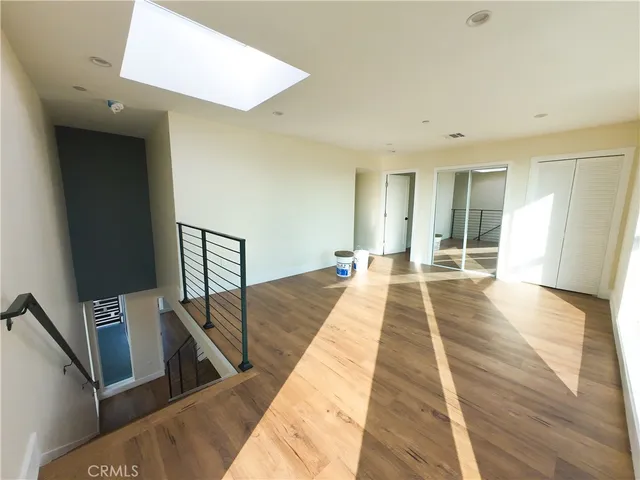 a view of a living room with furniture
