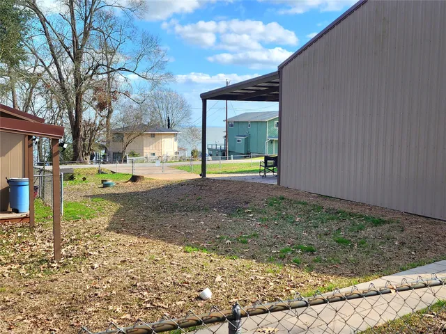 a view of a backyard with of trees