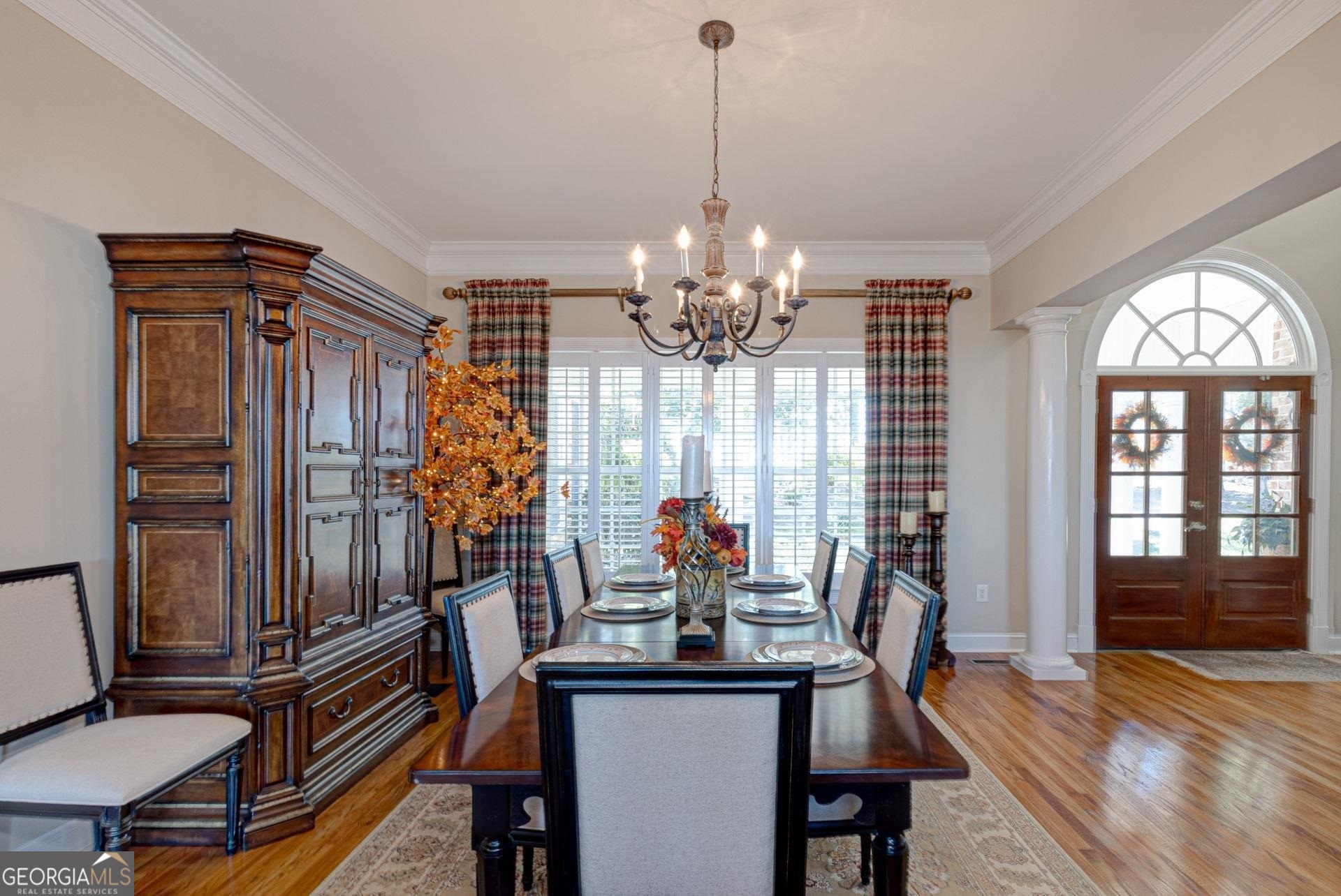 551 Mountain Ridge Drive Manchester, GA 31816 - Photo 7 of 72 Spacious dining area offers double windows with plantation shutters and window treatments. Columns in this area make a grand statement.