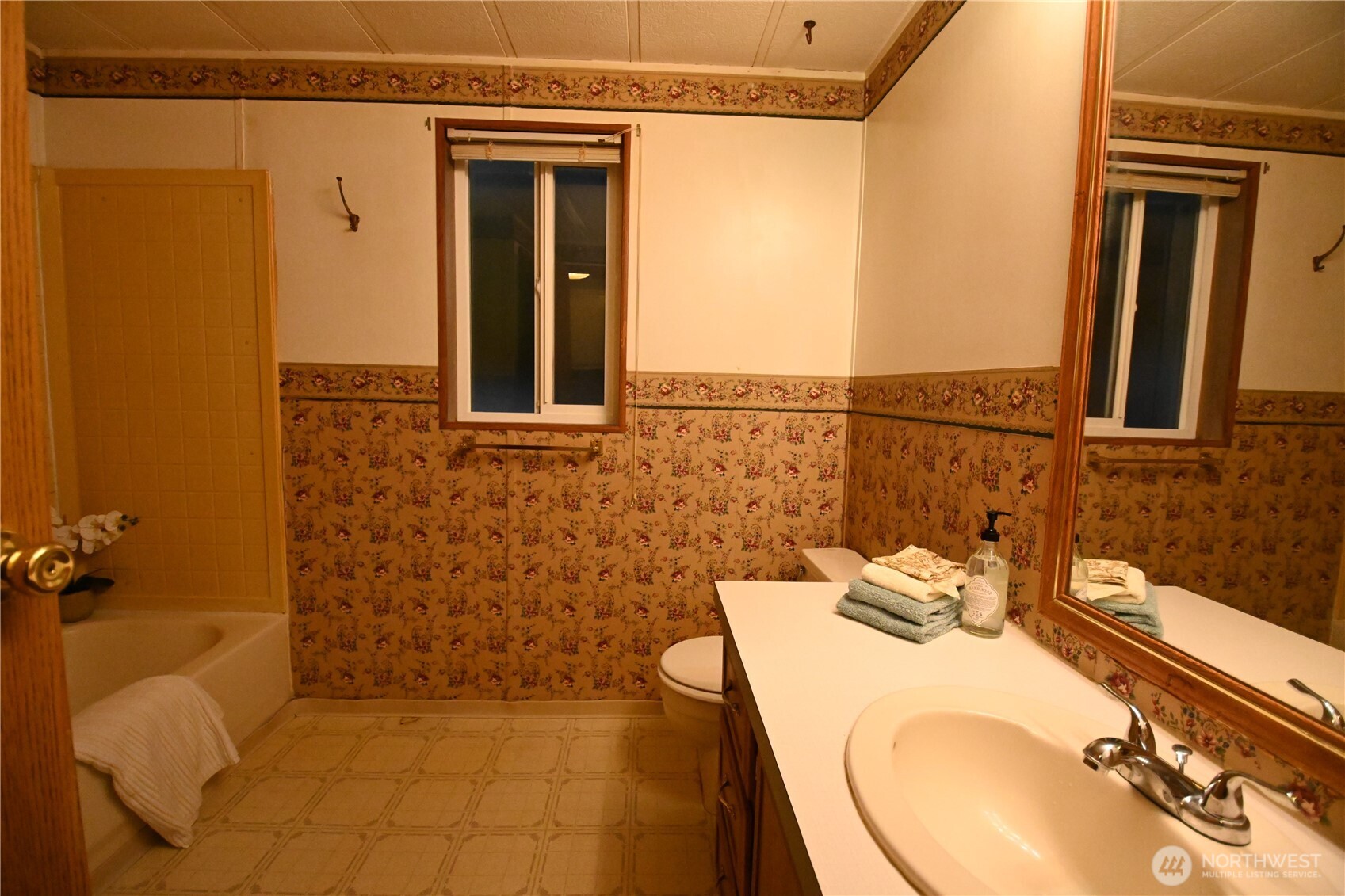 604 Blueberry Lane Gold Bar, WA 98251 - Photo 13 of 24 a bathroom with a sink and mirror