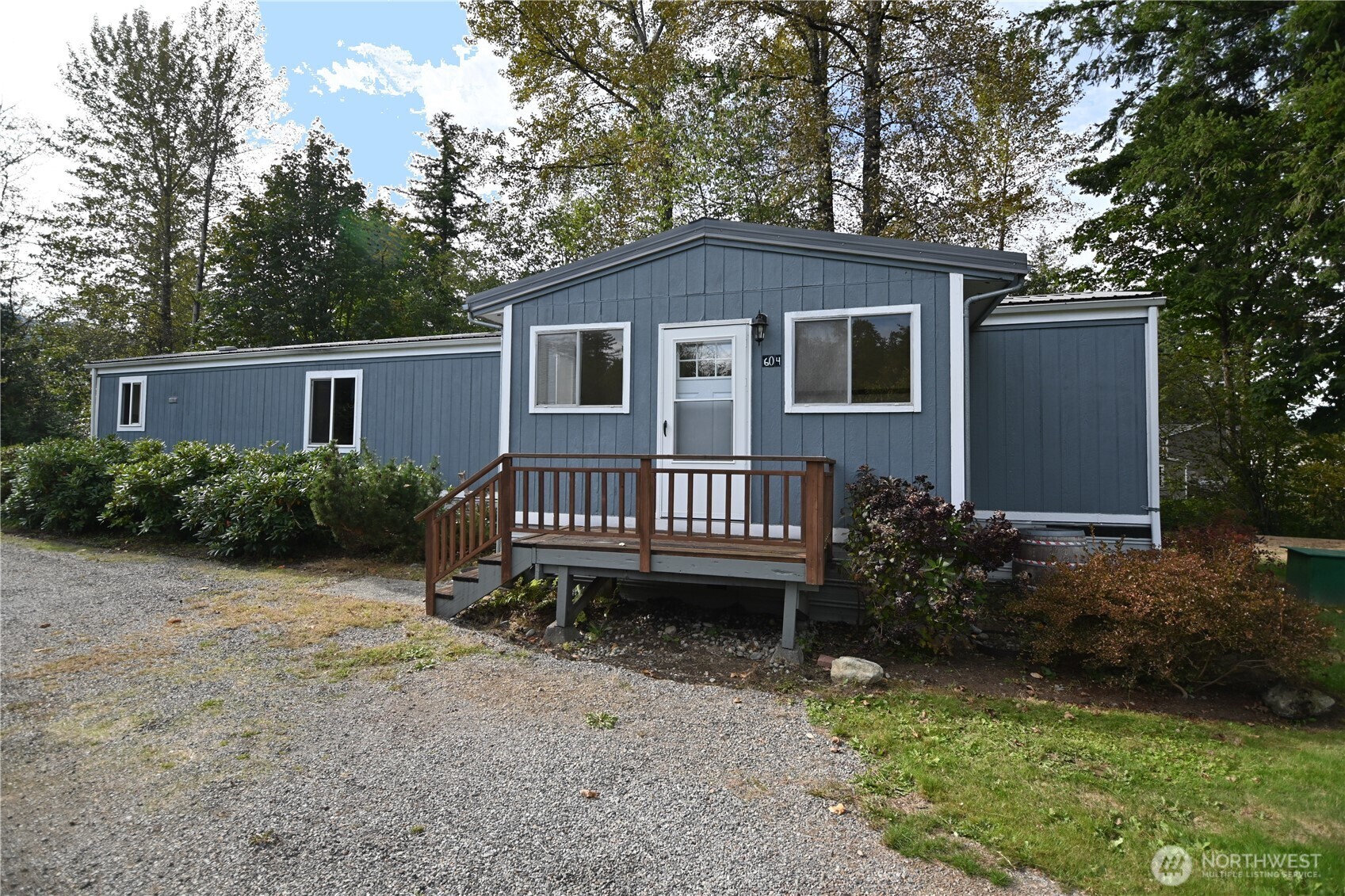604 Blueberry Lane Gold Bar, WA 98251 - Photo 14 of 24 a view of a house with a yard and wooden fence