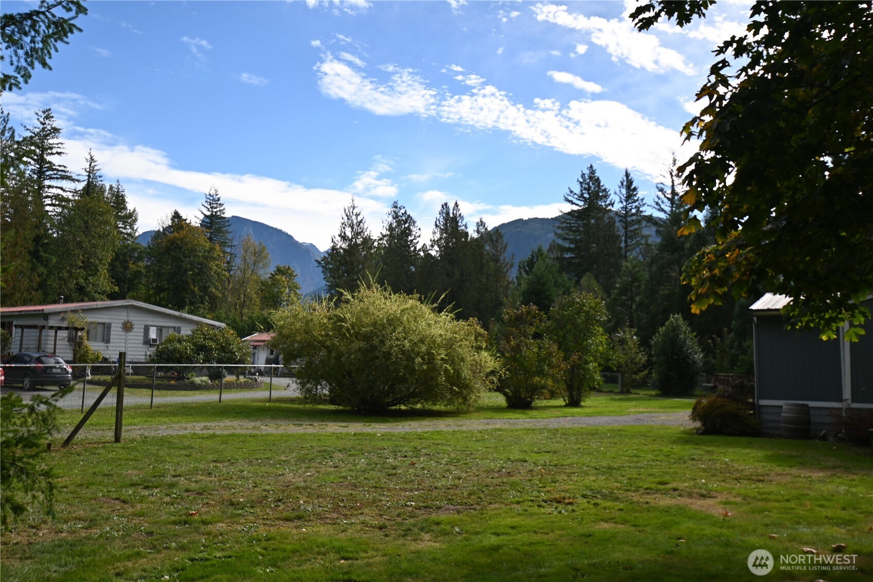 604 Blueberry Lane Gold Bar, WA 98251 - Photo 19 of 24 a backyard of a house with lots of green space