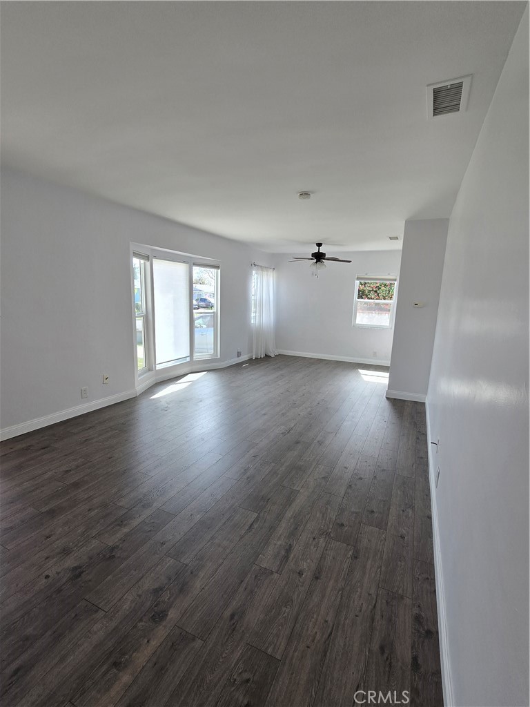 2303 Graydon Avenue Monrovia, CA 91016 - Photo 3 of 16 an empty room with wooden floor and windows