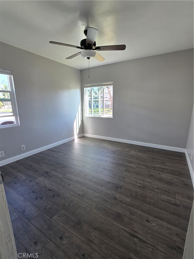 2303 Graydon Avenue Monrovia, CA 91016 - Photo 6 of 16 a view of an empty room with wooden floor and a window