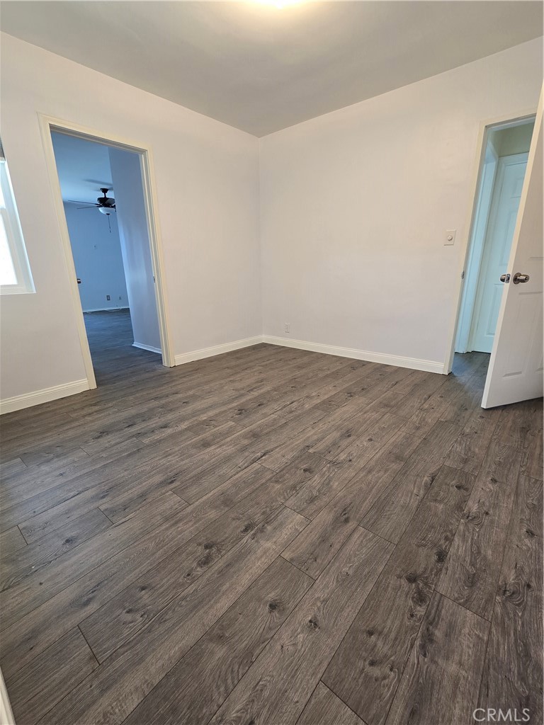 2303 Graydon Avenue Monrovia, CA 91016 - Photo 8 of 16 a view of an empty room with wooden floor and a window