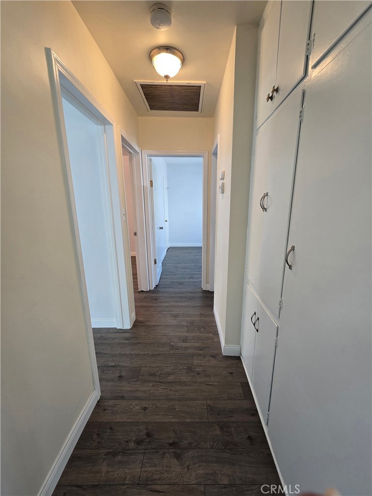 2303 Graydon Avenue Monrovia, CA 91016 - Photo 9 of 16 a view of a hallway with wooden floor and staircase