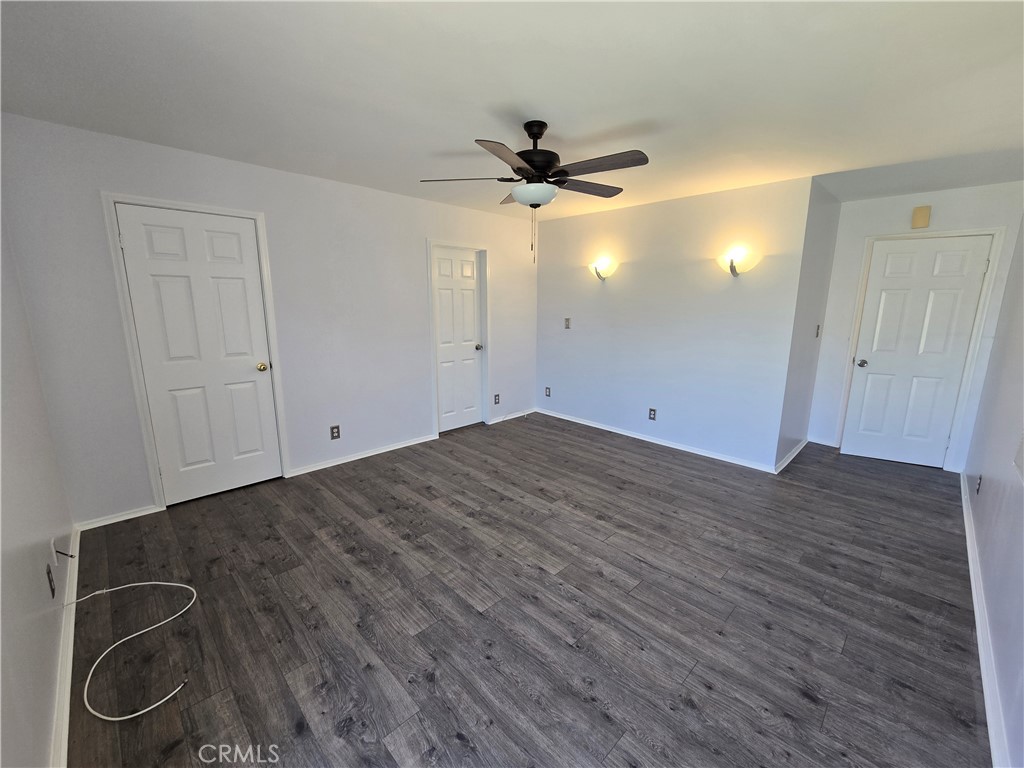 2303 Graydon Avenue Monrovia, CA 91016 - Photo 10 of 16 an empty room with wooden floor closet and fan
