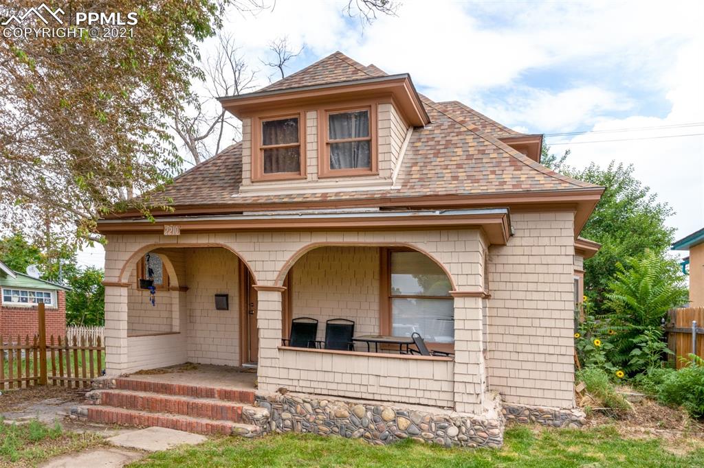 2210 East Routt Avenue Pueblo, CO 81004 - Photo 2 of 23 a view of front of a house with a porch