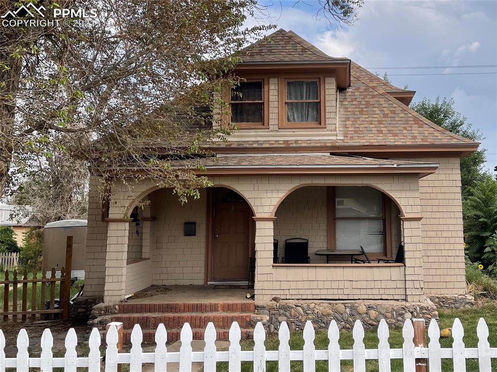 2210 East Routt Avenue Pueblo, CO 81004 - Photo 15 of 23 a front view of a house
