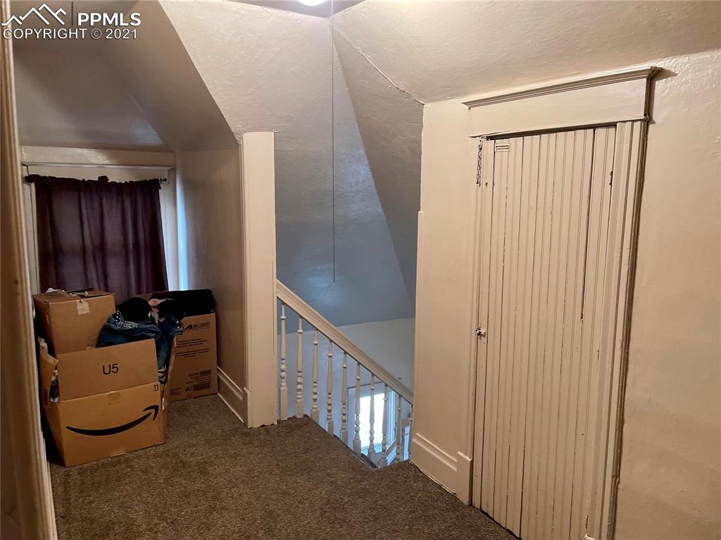 2210 East Routt Avenue Pueblo, CO 81004 - Photo 20 of 23 a view of a hallway with seating area