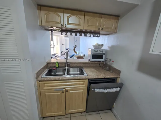 a utility room with washer and dryer