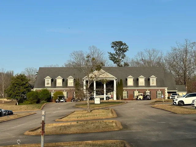 a front view of a building with street view