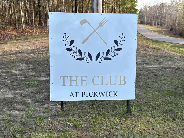 a sign that is on the side of a building