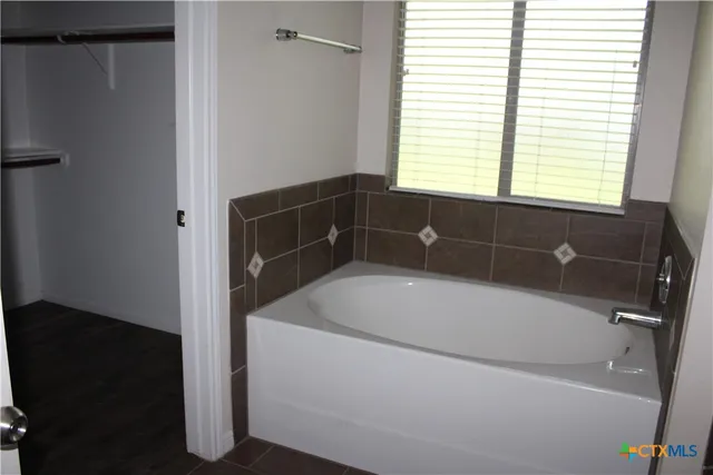 a bathroom with a bathtub