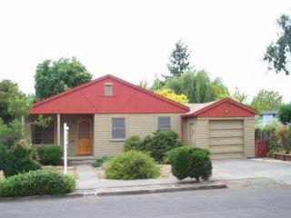1919 Beaver Santa Rosa, CA 95401 - Photo 1 of 1 a front view of a house with a yard and garage