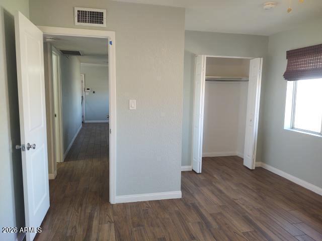 308 South 3rd Street Buckeye, AZ 85326 - Photo 16 of 37 a view of a hallway with wooden floor