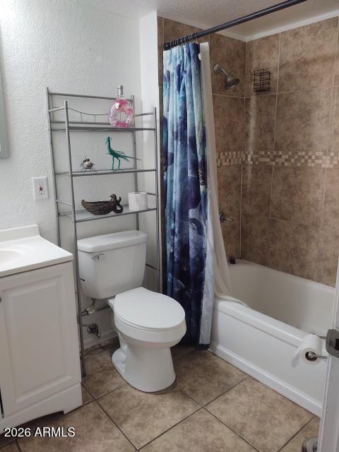 308 South 3rd Street Buckeye, AZ 85326 - Photo 17 of 37 a bathroom with a toilet sink and shower