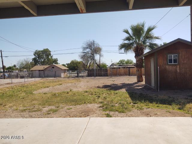 308 South 3rd Street Buckeye, AZ 85326 - Photo 32 of 37 a view of a yard in front of a house