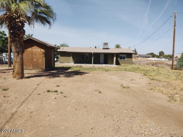 308 South 3rd Street Buckeye, AZ 85326 - Photo 33 of 37 a view of a house with a yard