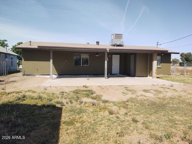 308 South 3rd Street Buckeye, AZ 85326 - Photo 34 of 37 a view of a house with wooden fence