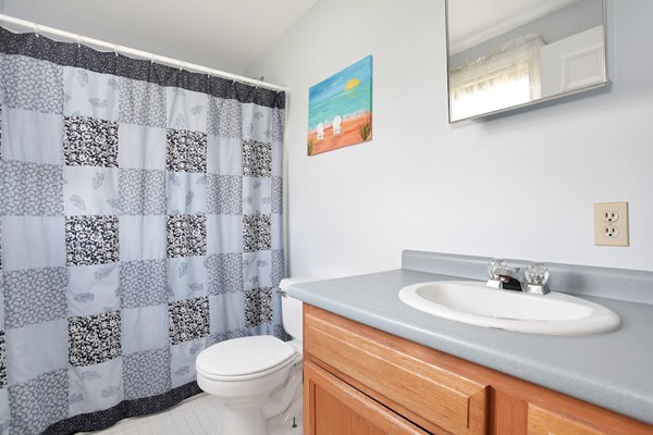 11 Robbins Road Ayer, MA 01432 - Photo 20 of 30 a bathroom with a sink and a toilet