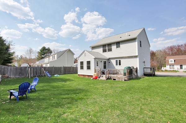 11 Robbins Road Ayer, MA 01432 - Photo 26 of 30 a view of a house with a yard and sitting area