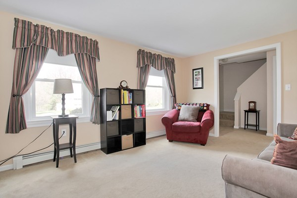 11 Robbins Road Ayer, MA 01432 - Photo 4 of 30 a living room with furniture and a window