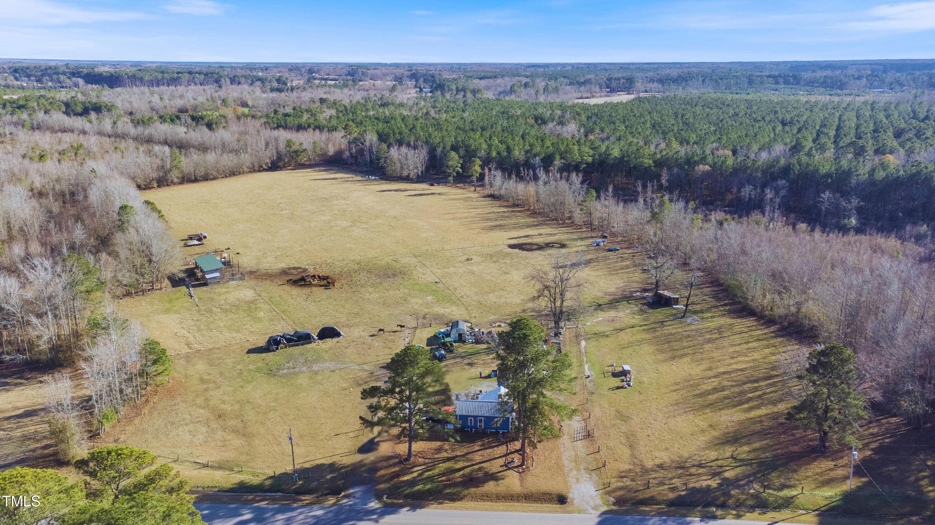 9153 St Mary's Church Road Kenly, NC 27542 - Photo 2 of 8 a view of a lake with a mountain