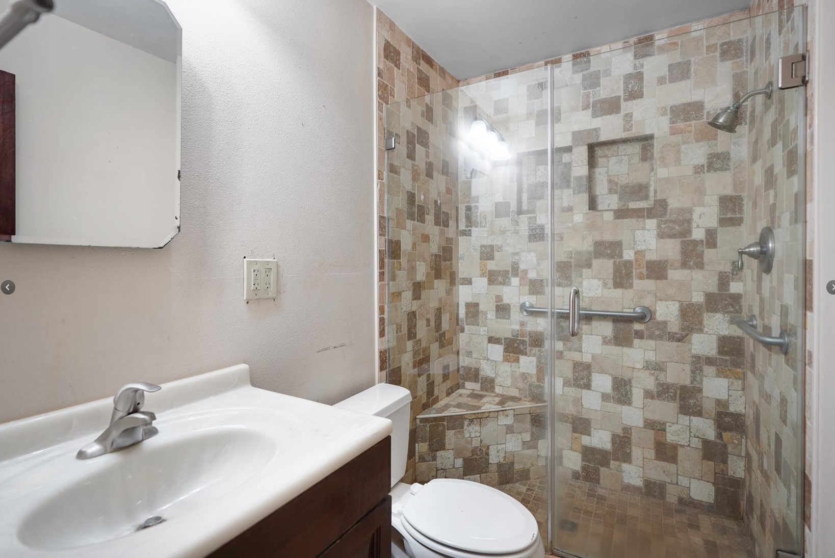 22855 East Martin Drive Porter, TX 77365 - Photo 12 of 22 a bathroom with a sink toilet and shower