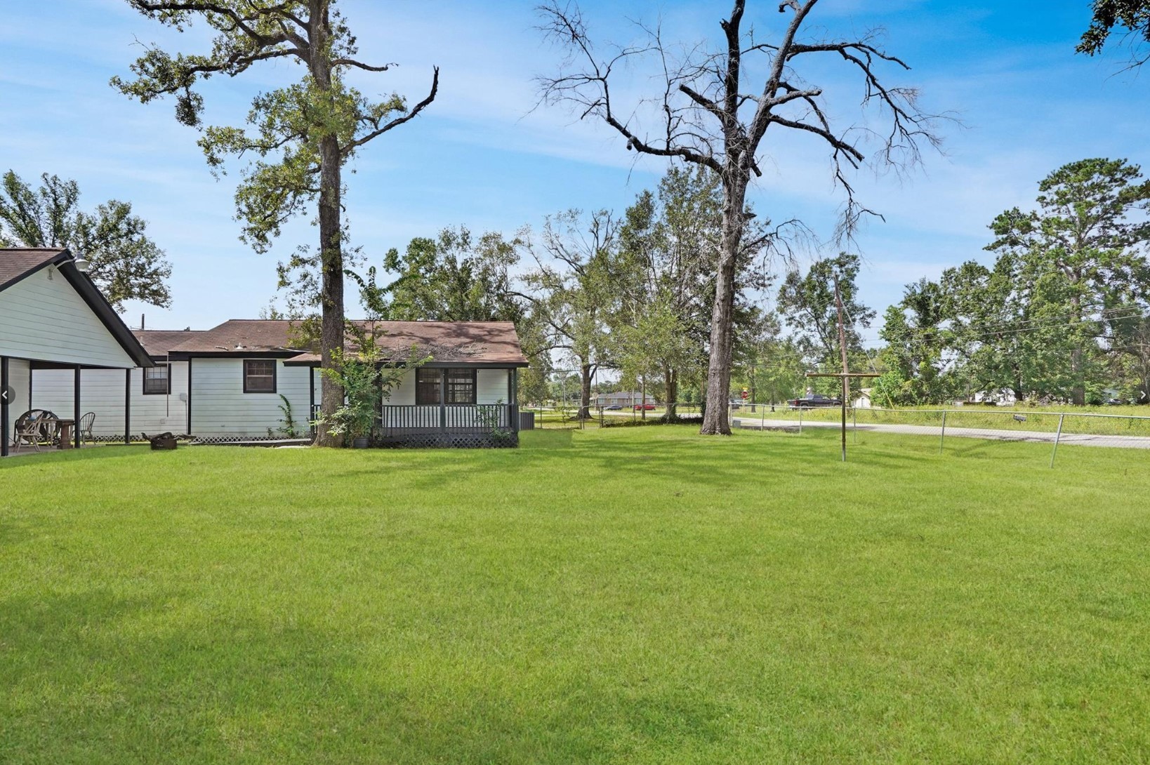 22855 East Martin Drive Porter, TX 77365 - Photo 15 of 22 a front view of a house with a garden